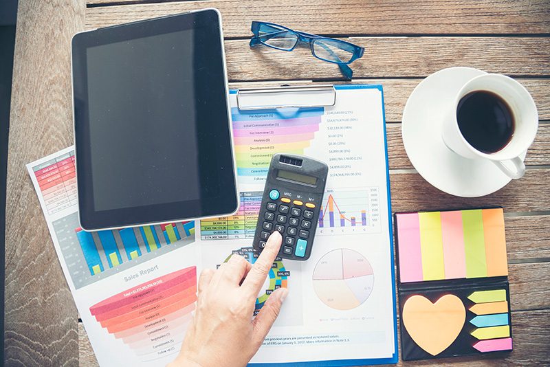 NonProfitImage Image of paperwork and sticky notes with a calculator